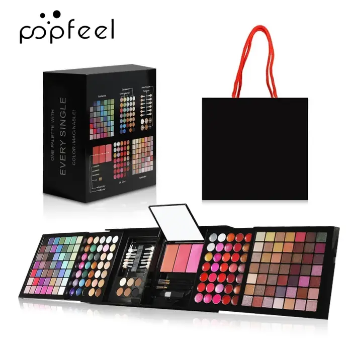 Maquillage POPFEEL (ombres à paupières, blush, gloss à lèvres, correcteur), un miroir et des outils 