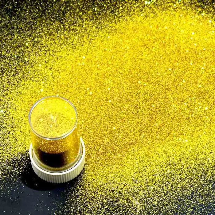 Poudre à paillettes pour le visage et le corps