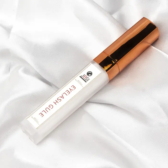Colle pour faux cils, véritable